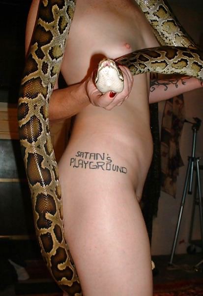 Beautiful girl with a snake #6529137