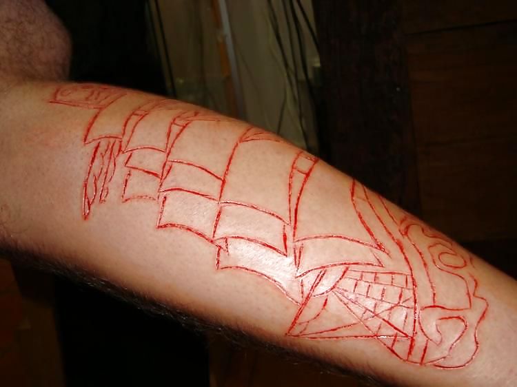 Scarification - children most in vogue physique modification #9454179