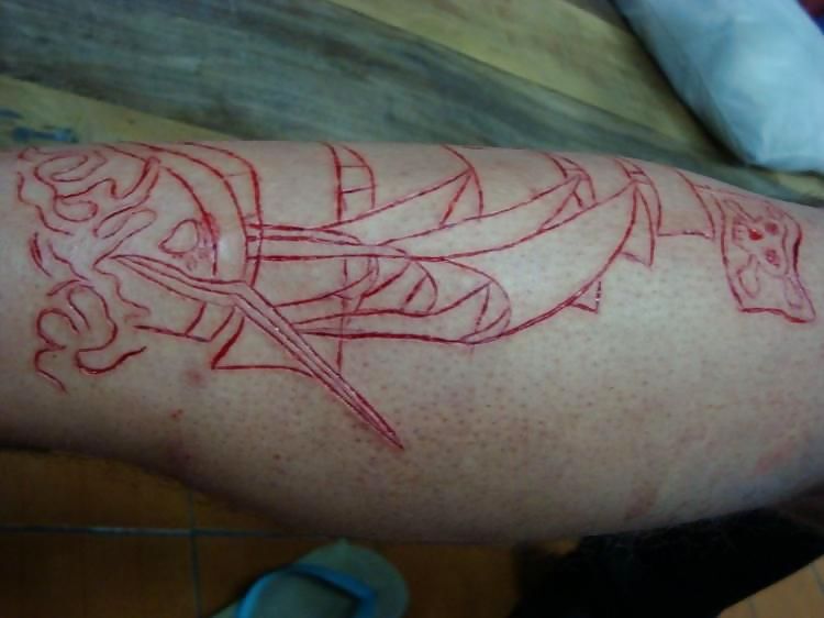 Scarification - teens most popular body modification #9454189