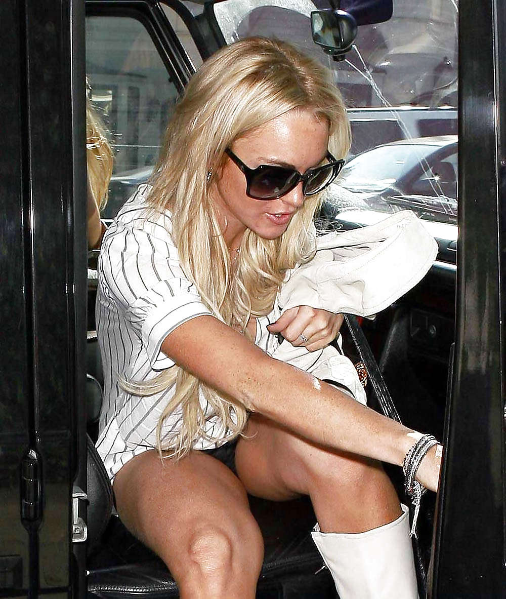 Lindsay Lohan showing off major cleavage shirt & shorts #3929675
