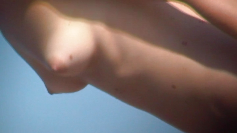 Girl at beach with tiny perky boobs #1158910