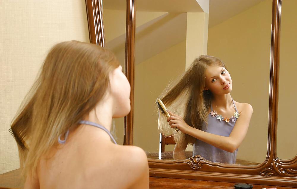 Cute russian teen Julia doing make-up #7337507