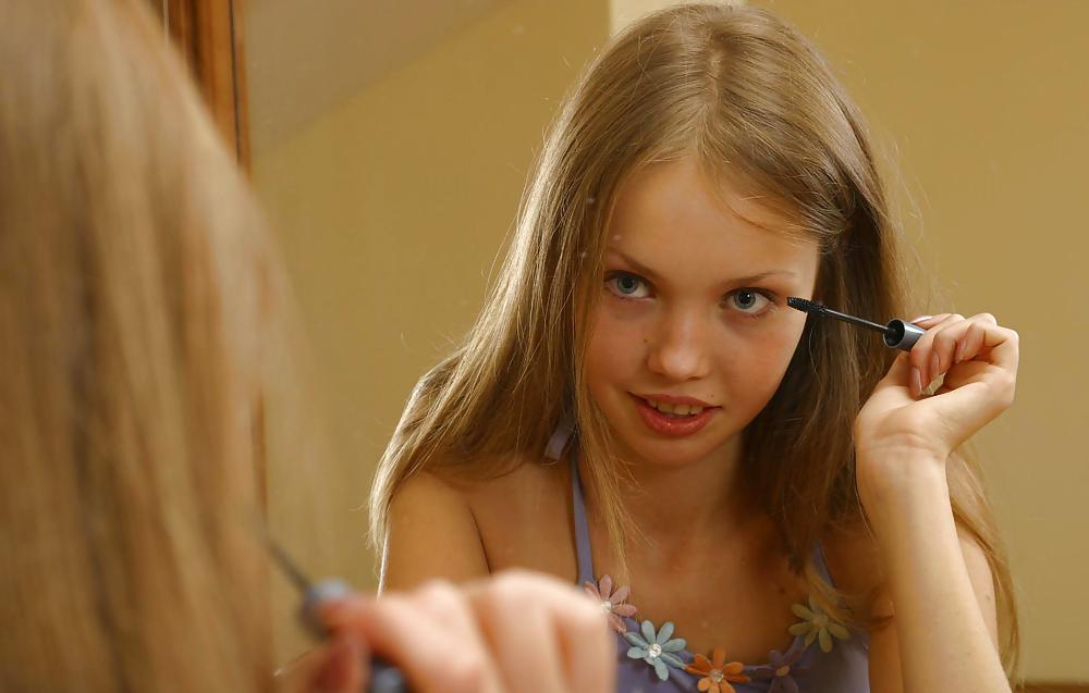 Cute russian teen Julia doing make-up #7337900