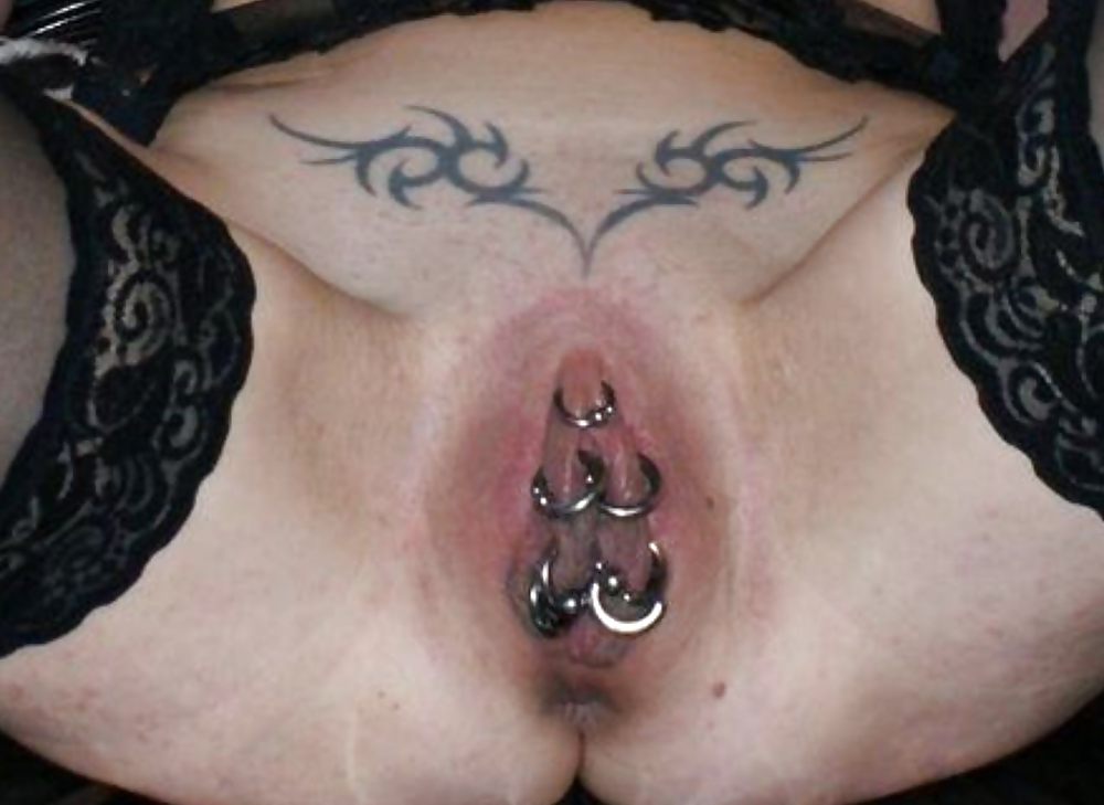 Weird tattooed and pierced pussies #21554252