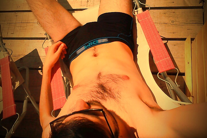 A pale guy sunbathing #14699129
