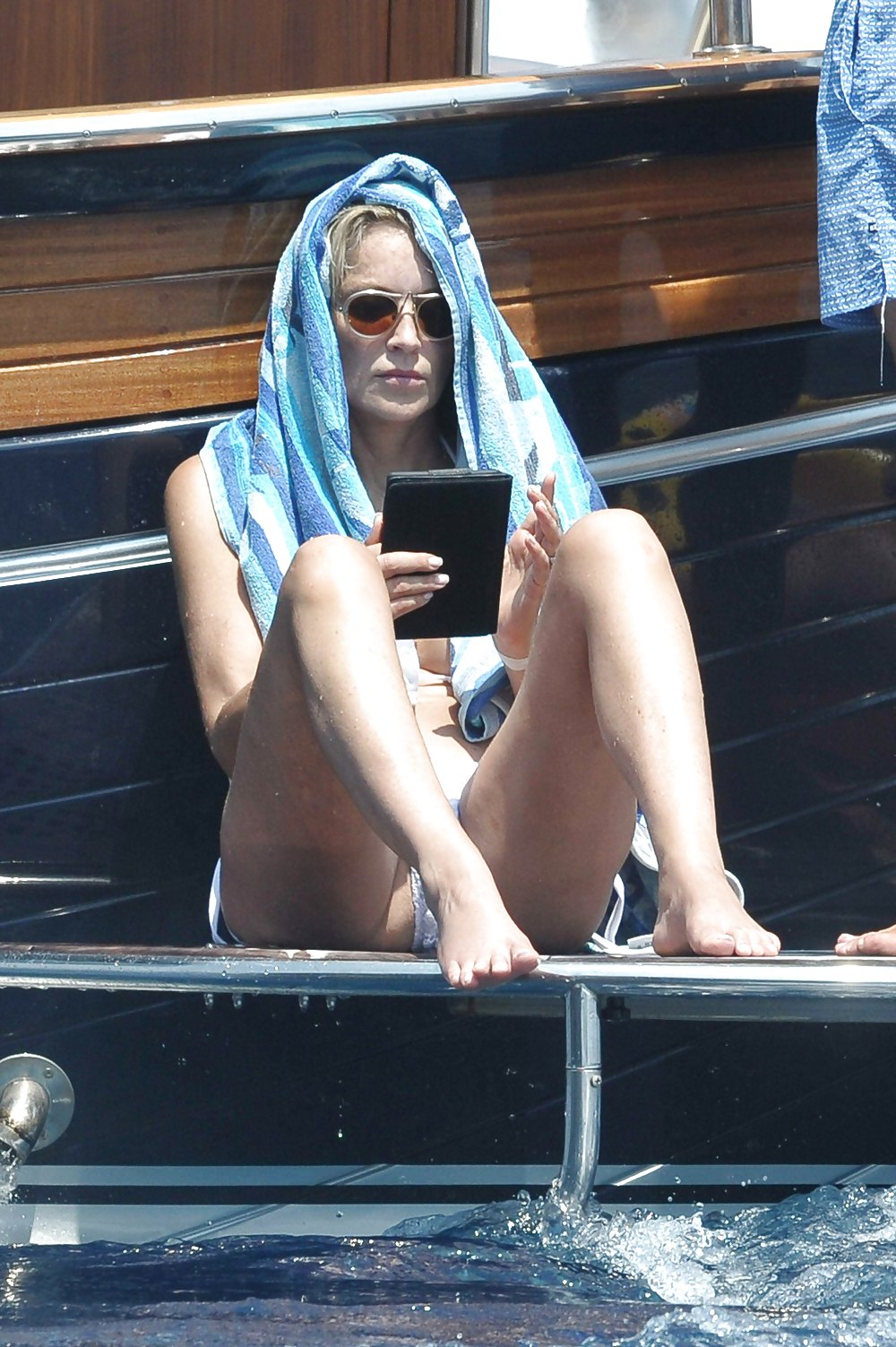 Sharon Stone - Spreading in Bikini (July 24, 2013) #21065587