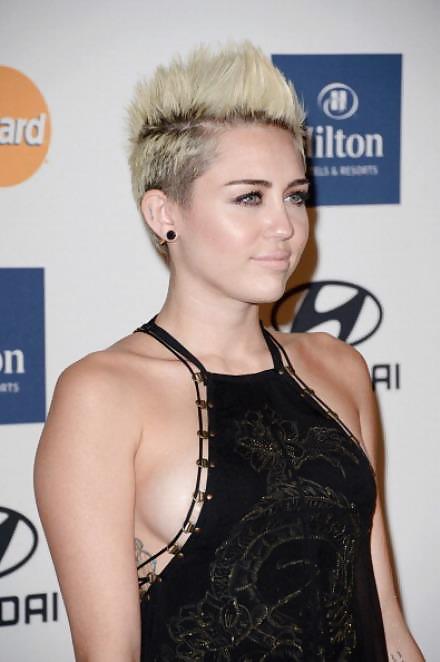 Sexy Dress Miley Cyrus at the Clive Davis Grammy Party 2013 #18572082