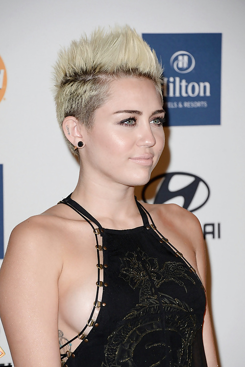 Sexy Dress Miley Cyrus at the Clive Davis Grammy Party 2013 #18572147