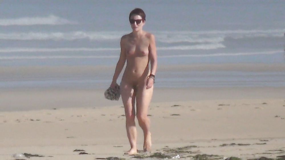 Nude girl walking on european beach #21830984