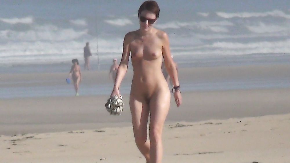 Nude girl walking on european beach #21830994