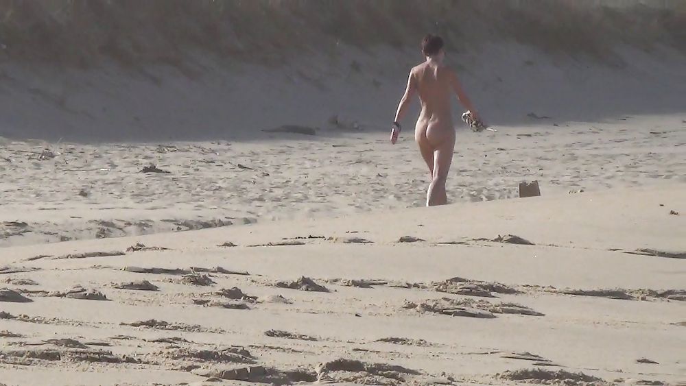 Nude girl walking on european beach #21831005