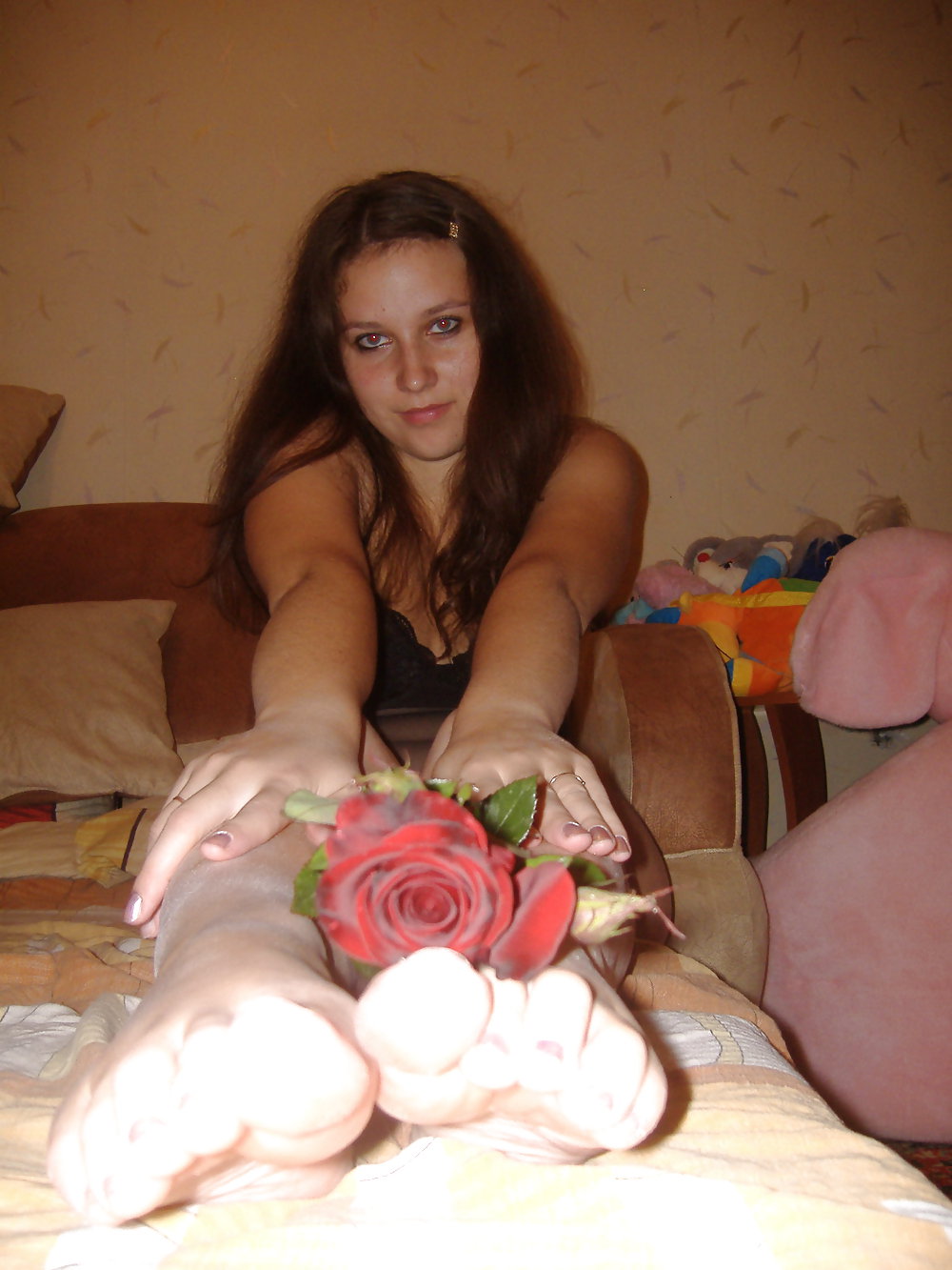 Brunette teen posing with a rose #11860881