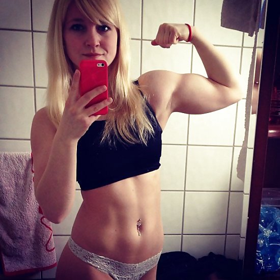 Beautiful girl with beautiful and strong biceps #14985290