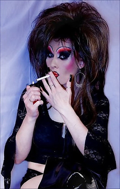 Smoking  glam transvestite with heavy make up #13904133