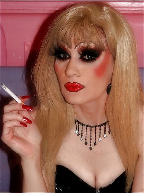Smoking  glam transvestite with heavy make up #13904139