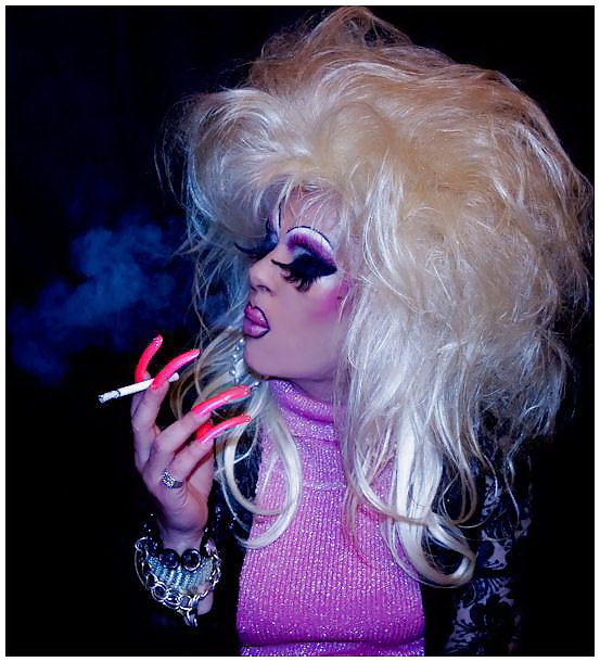 Smoking  glam transvestite with heavy make up #13904187