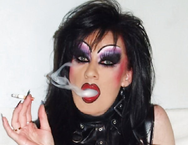 Smoking  glam transvestite with heavy make up #13904213
