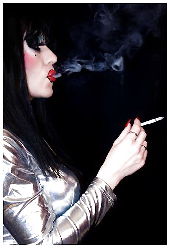 Smoking  glam transvestite with heavy make up #13904267