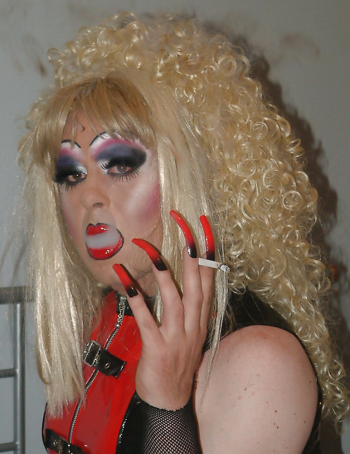 Smoking  glam transvestite with heavy make up #13904274