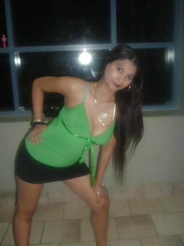 Latina showing off the items 