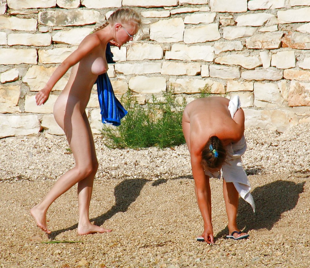 MOTHER & DAUGHTER's friend ON THE BEACH #1829433