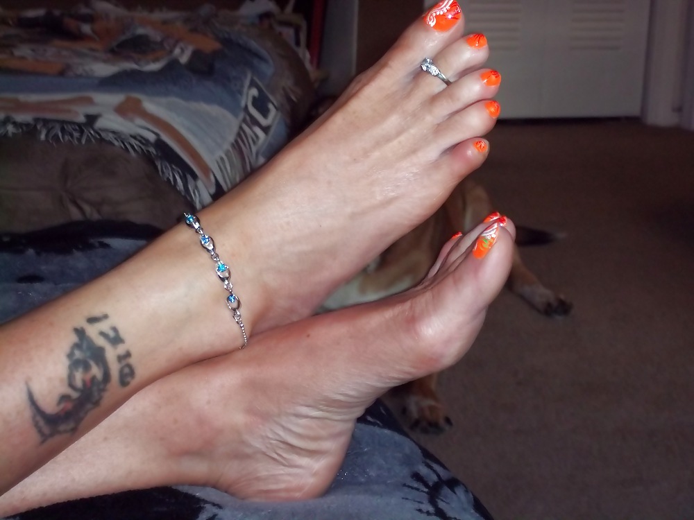 Chance's long tan legs and neon orange toes #9047415