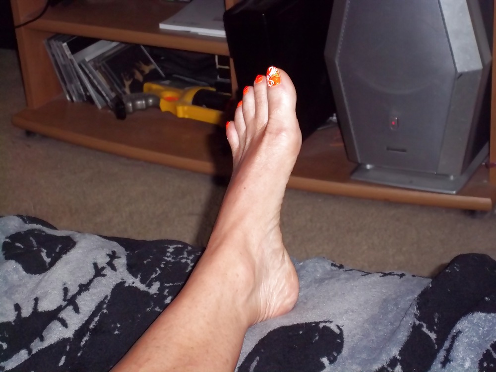 Chance's long tan legs and neon orange toes #9047460