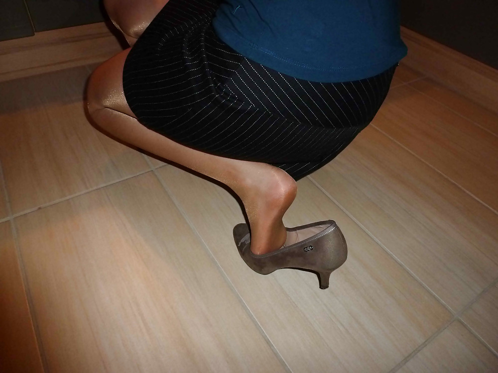 Nylons and shoes in the kitchen #18034028