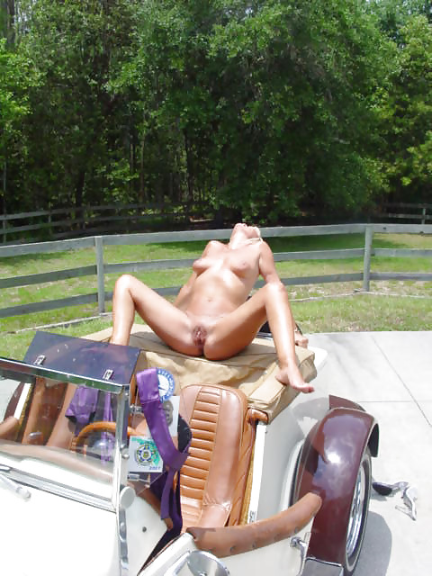 Naked mature on the old car possing outdoors #11534345