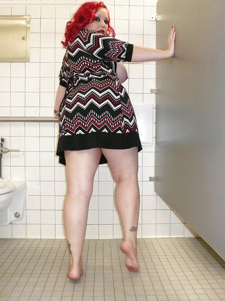 April washes her toes within the ladys room #9452158