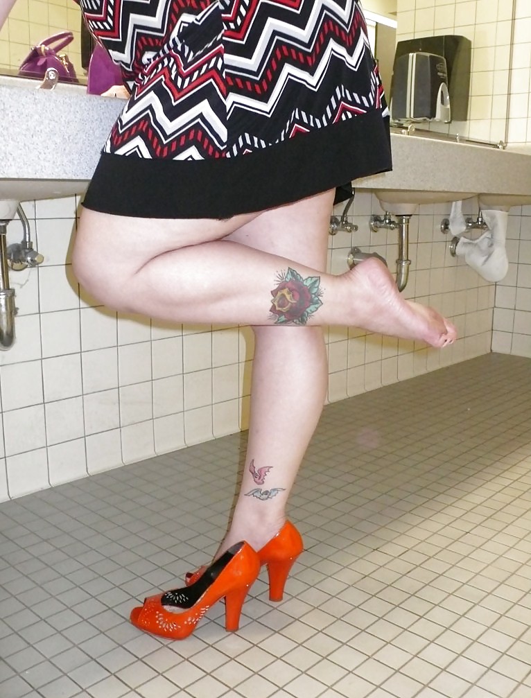 April washes her toes within the ladys room #9452171