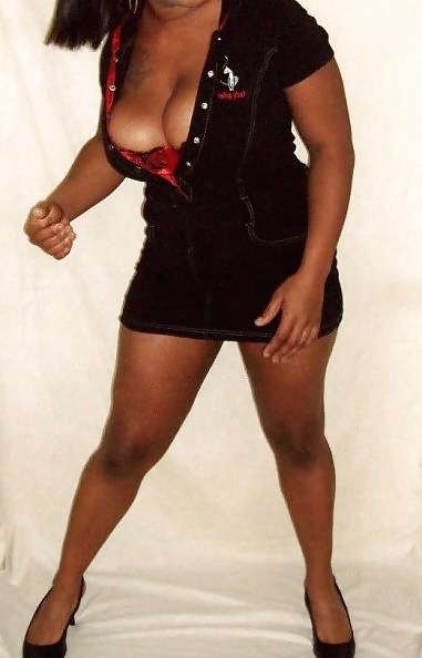 Ebony Milf showing her big tits
