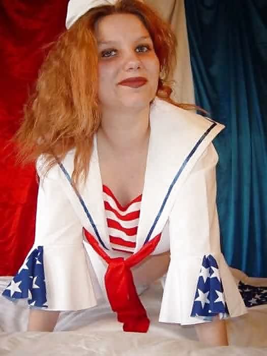 Pregnant redhead taking off her sailors uniform #11952591