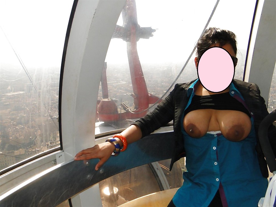 Una moglie indiana che lampeggia su london eye
 #34360340