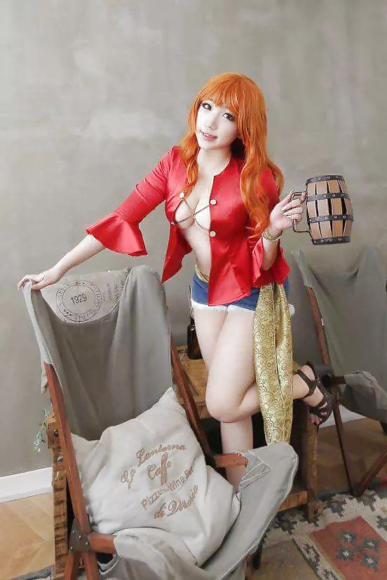 Nami cosplayers (One Piece) #29340995