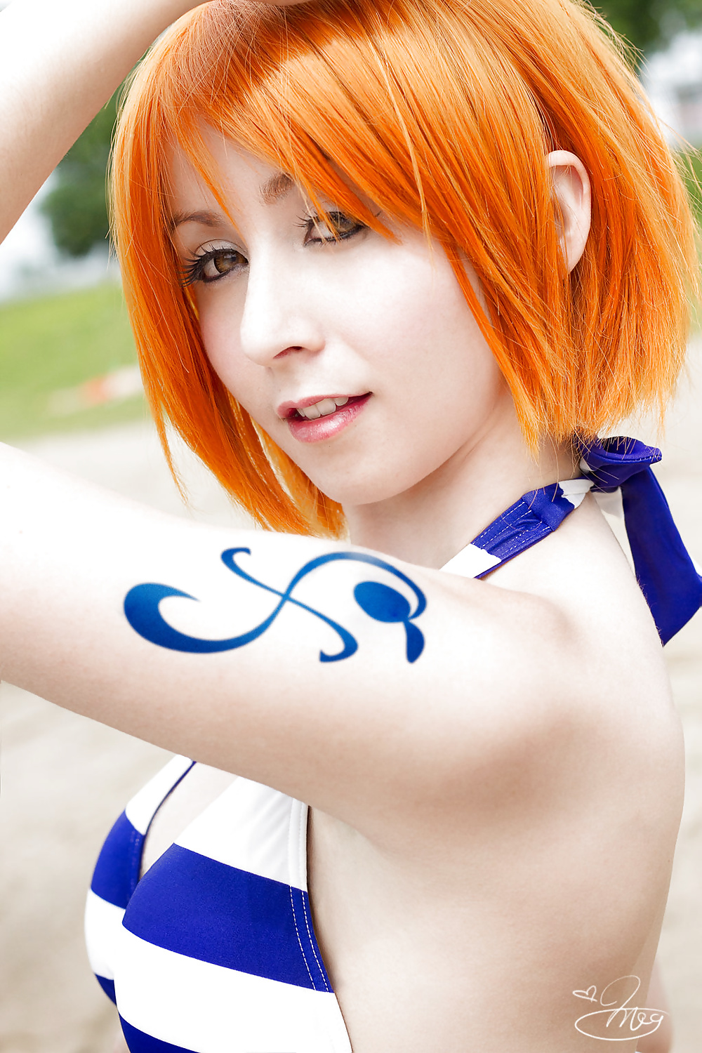 Nami cosplayers (One Piece) #29341093