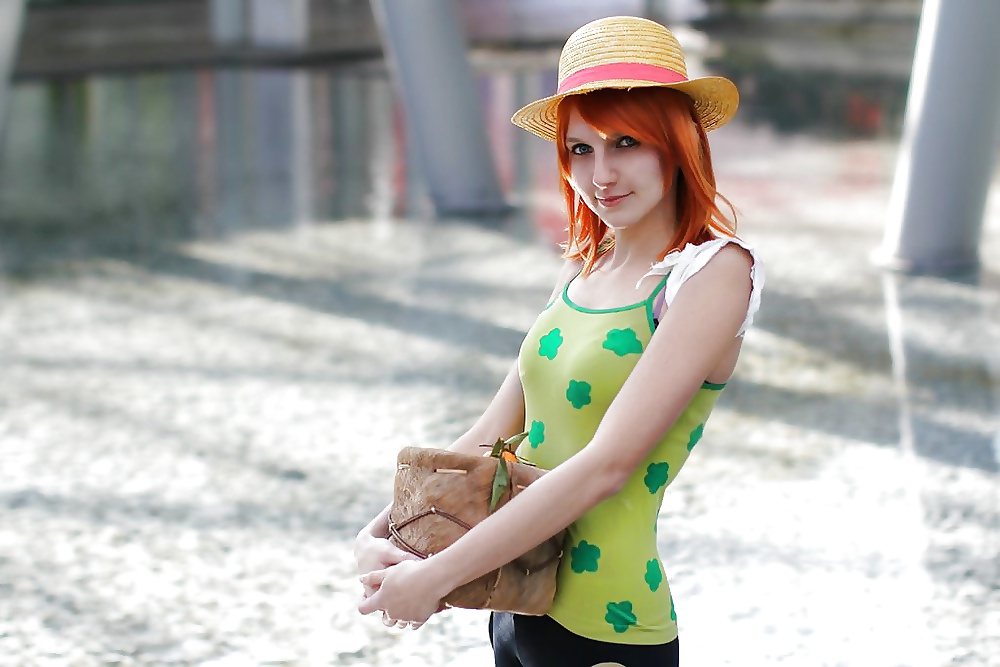 Nami cosplayers (One Piece) #29341363