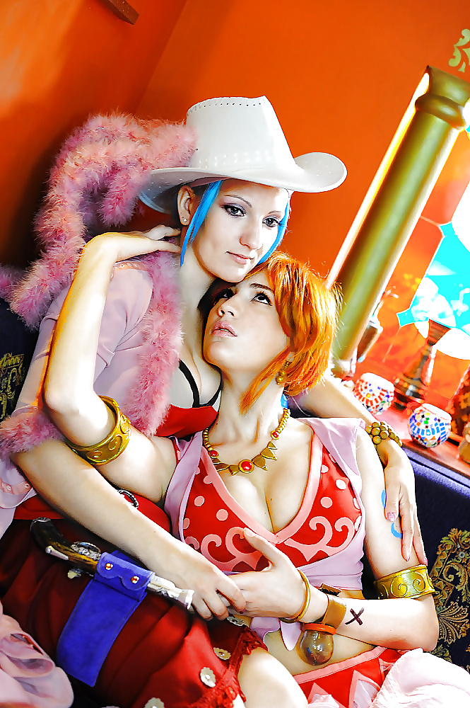 Nami cosplayers (One Piece) #29341477