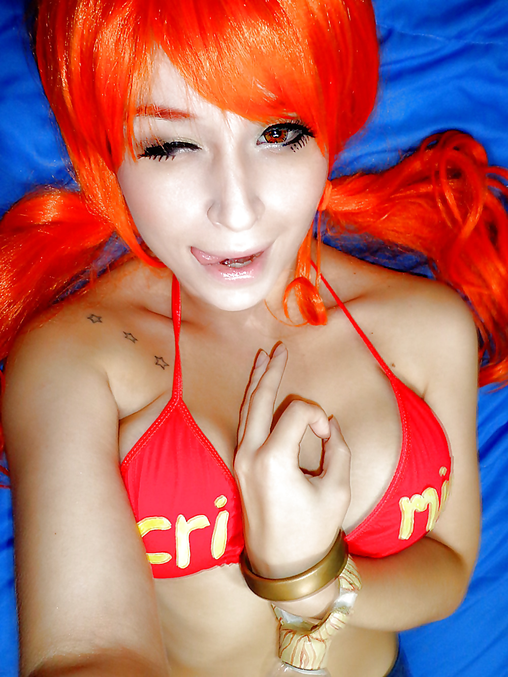 Nami cosplayers (One Piece) #29341494