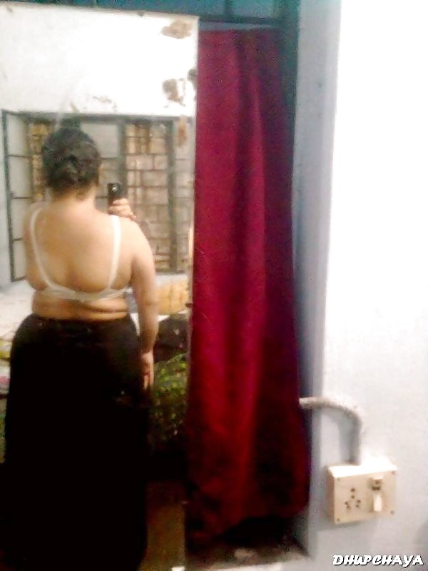 Bengali MILF stripping off bra panty to reveal big tits  #24571340