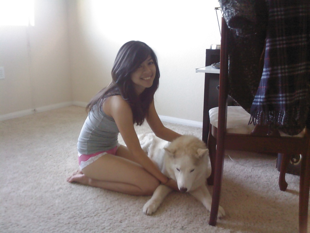Sexy asian girl with white husky #27031297