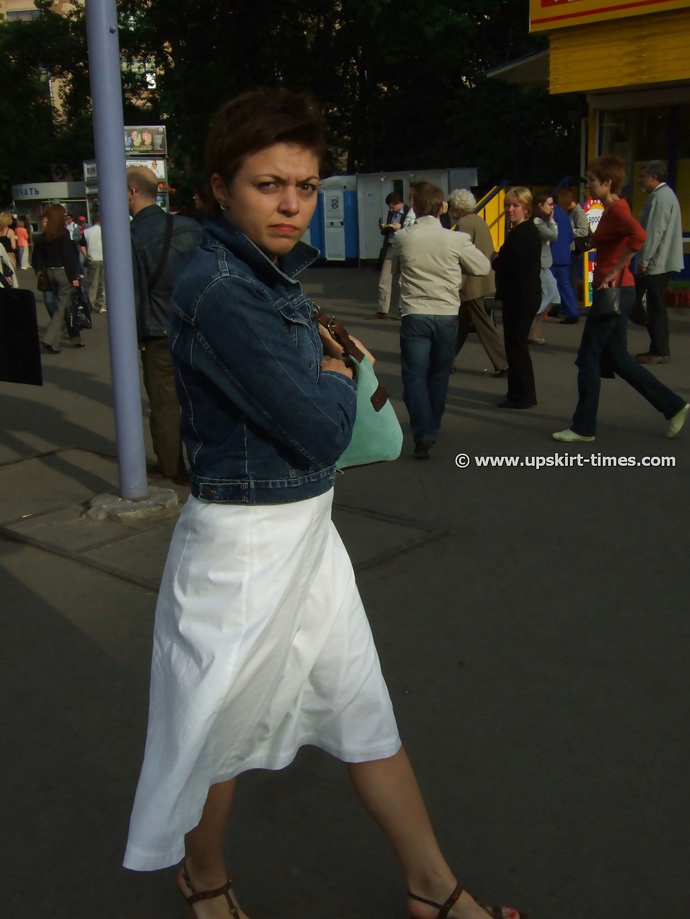 Brunette in a long white skirt #34367586