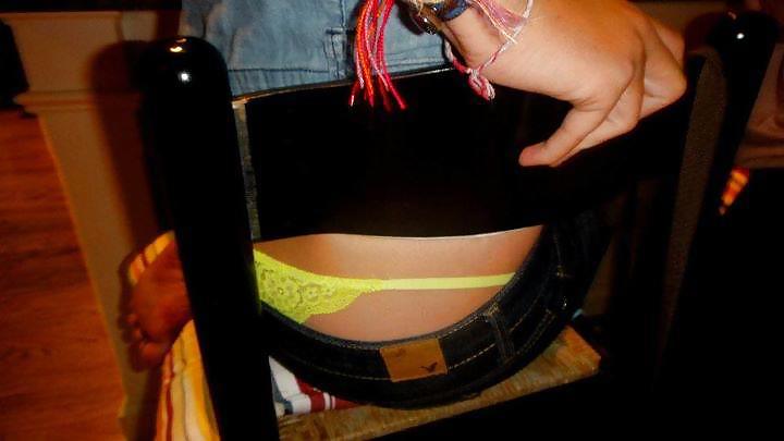 Sexy thong peek and ass.