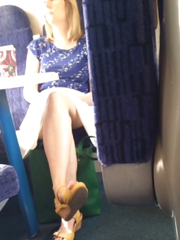 Milf shows legs and upskirt on train #33305667