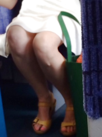 Milf shows legs and upskirt on train #33305674