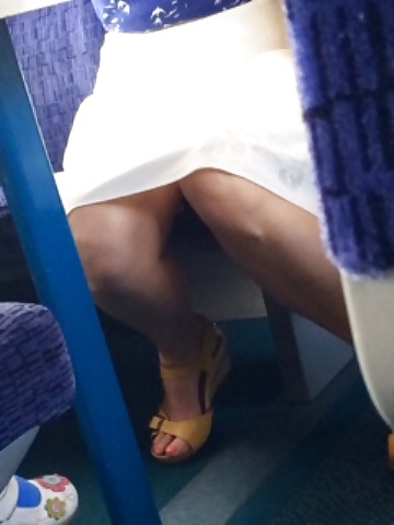 Milf shows legs and upskirt on train #33305684