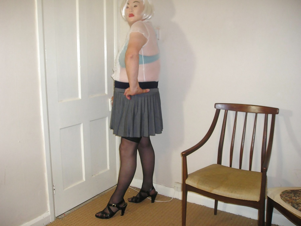 Nurse in grey skirt and white blouse #27338480