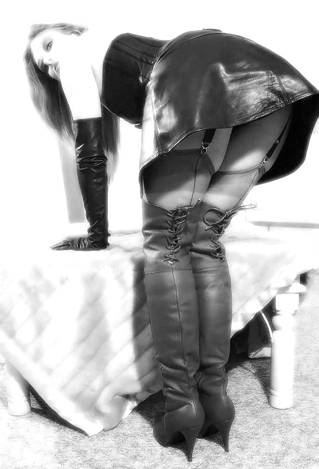 Black and white bdsm boots #23258586