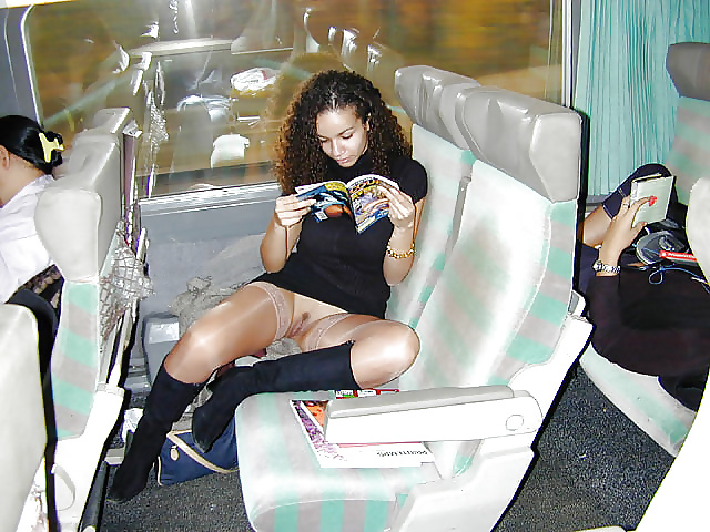 Women flashing stockings on public transport.  #39936996