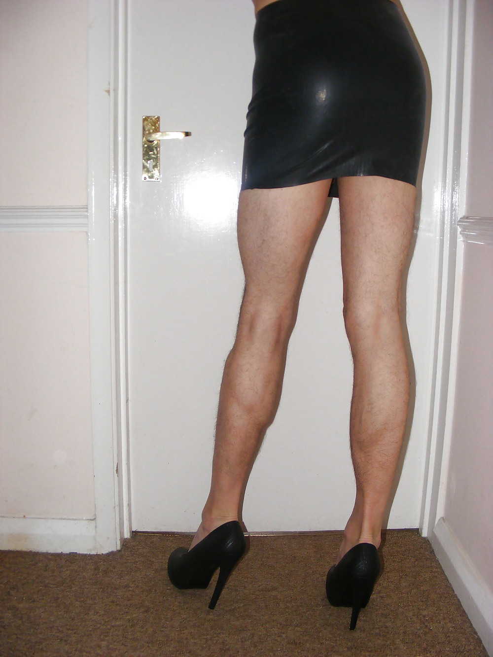 Latex miniskirt and heels #37036706